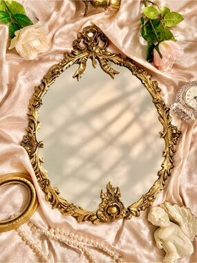 Vintage 1960’s MCM Brass Bow Mirror